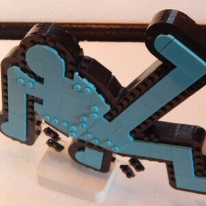 Keith Haring Lego Classic Dancing Figure in Blue.